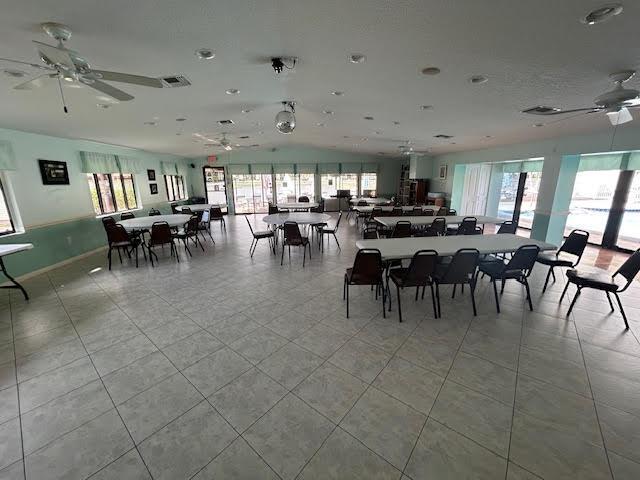 dining space featuring ceiling fan