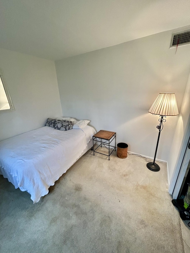 bedroom featuring carpet flooring