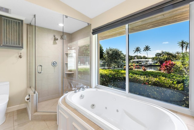 bathroom featuring tile patterned floors, plus walk in shower, and a water view