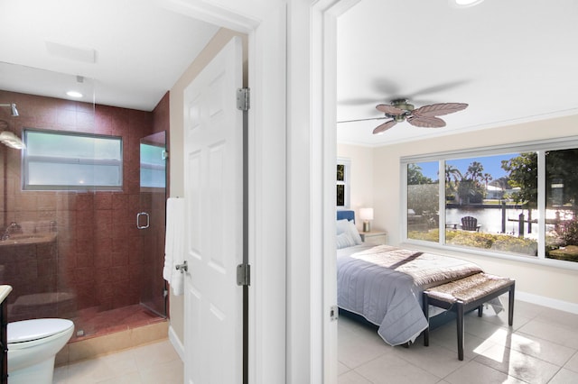 tiled bedroom with a water view