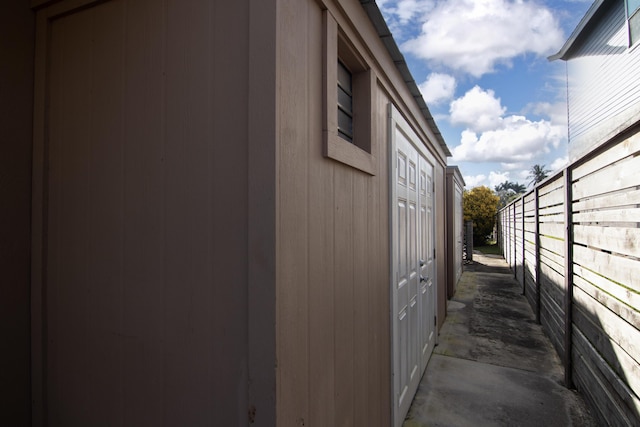 view of side of home featuring a garage