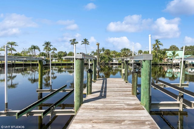 dock area featuring a water view