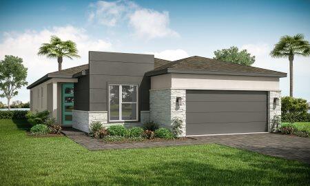 view of front of home with a garage and a front lawn