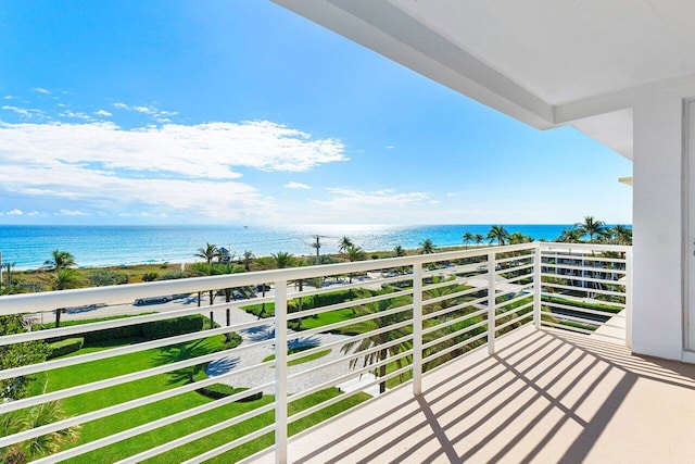 balcony featuring a water view