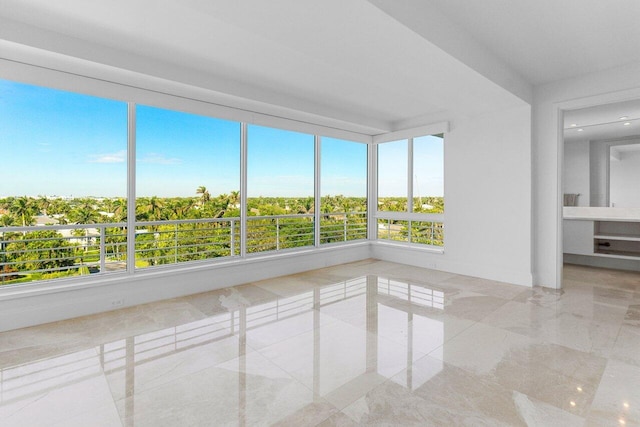 empty room featuring marble finish floor