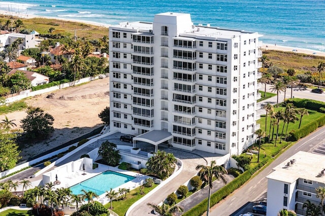 aerial view with a view of the beach and a water view