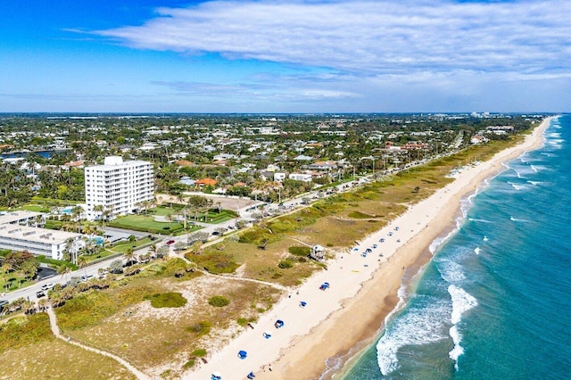 aerial view with a view of city, a beach view, and a water view