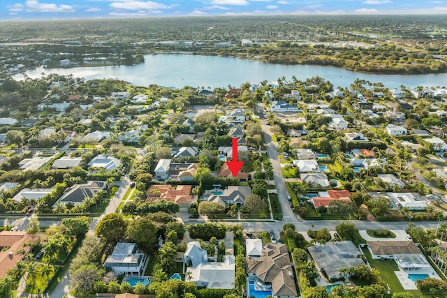 aerial view with a water view and a residential view