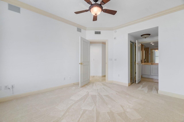 unfurnished room with light carpet, crown molding, and ceiling fan