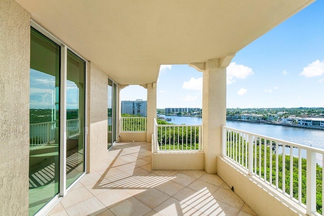 balcony featuring a water view