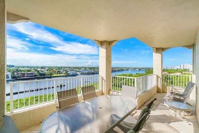 balcony featuring a water view