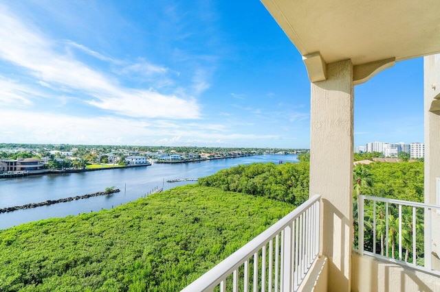 balcony featuring a water view