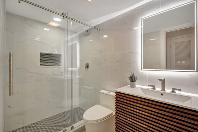 bathroom with walk in shower, toilet, tile walls, vanity, and backsplash