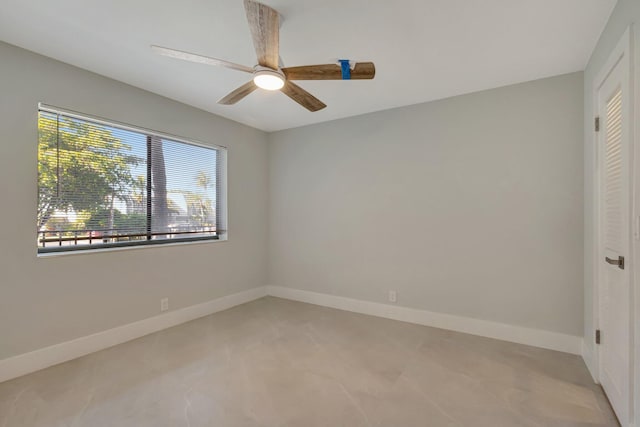 spare room with ceiling fan