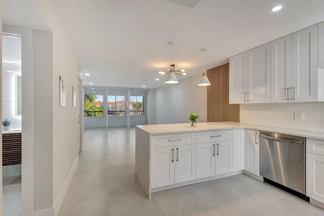 kitchen with white cabinetry, dishwasher, kitchen peninsula, and decorative backsplash