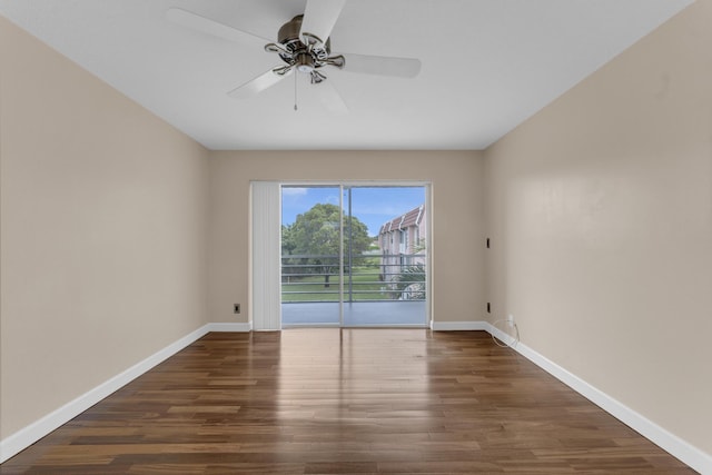 unfurnished room featuring dark hardwood / wood-style flooring and ceiling fan