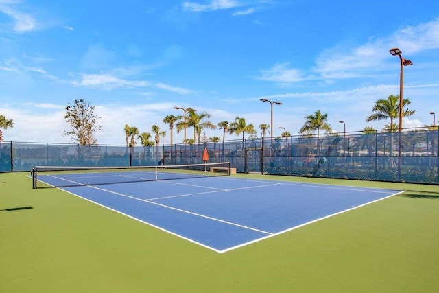 view of tennis court with basketball court