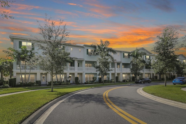 view of outdoor building at dusk