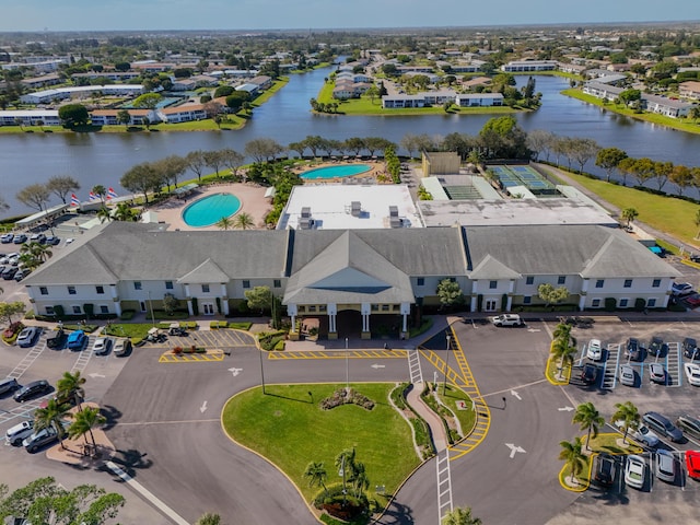 bird's eye view with a water view