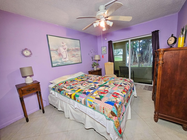 tiled bedroom featuring ceiling fan, a textured ceiling, and access to outside