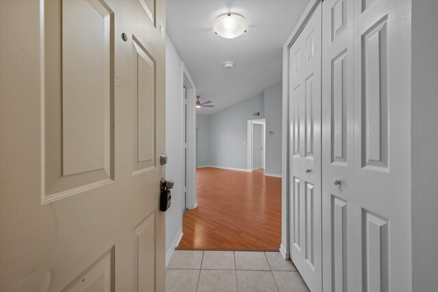 unfurnished room featuring lofted ceiling, a textured ceiling, dark hardwood / wood-style floors, and ceiling fan