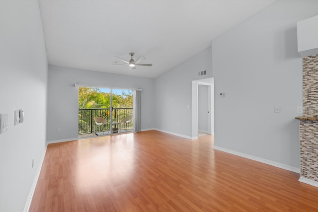 interior space featuring lofted ceiling, light hardwood / wood-style floors, and ceiling fan