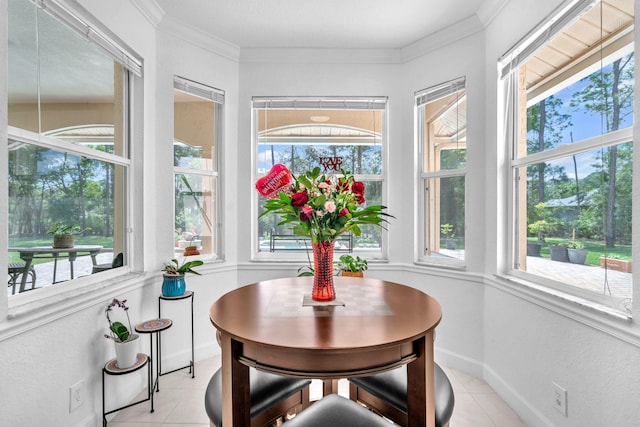 sunroom / solarium featuring a healthy amount of sunlight