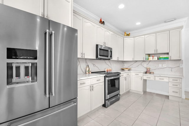 kitchen with stainless steel appliances, open shelves, light countertops, and white cabinets