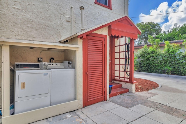 laundry room with separate washer and dryer