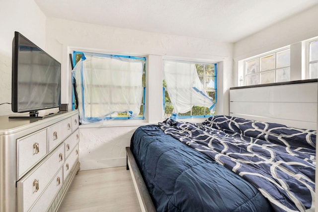 bedroom featuring light wood-type flooring