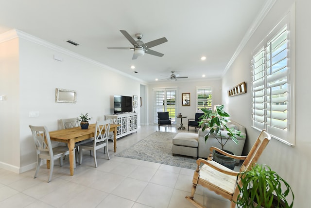 living room with crown molding and light tile patterned floors