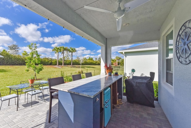 view of patio / terrace with ceiling fan