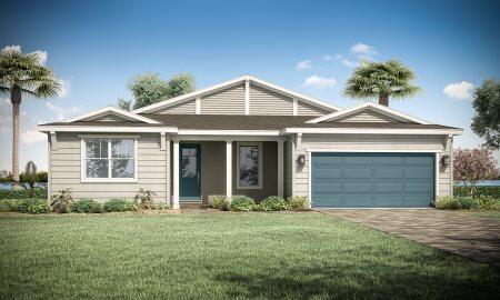 view of front of property featuring a garage and a front lawn