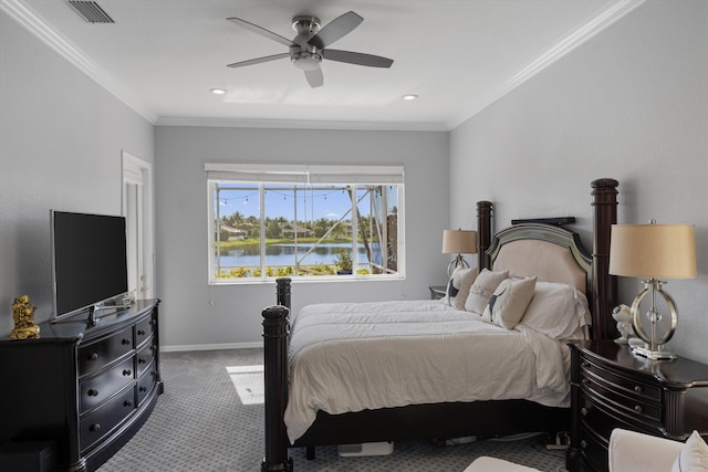 carpeted bedroom featuring ornamental molding and ceiling fan