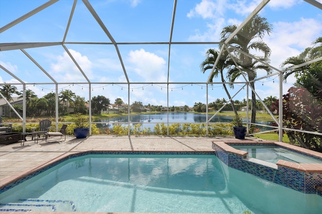 view of pool with a water view, an in ground hot tub, a patio area, and a lanai