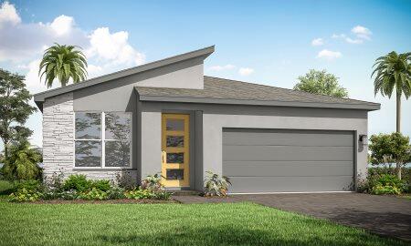 view of front of home featuring a garage and a front yard