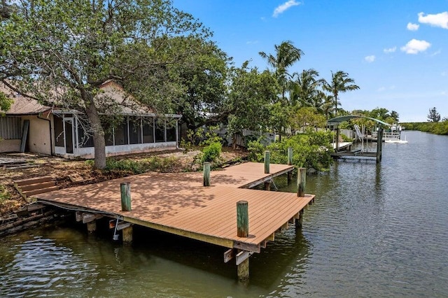 dock area featuring a water view