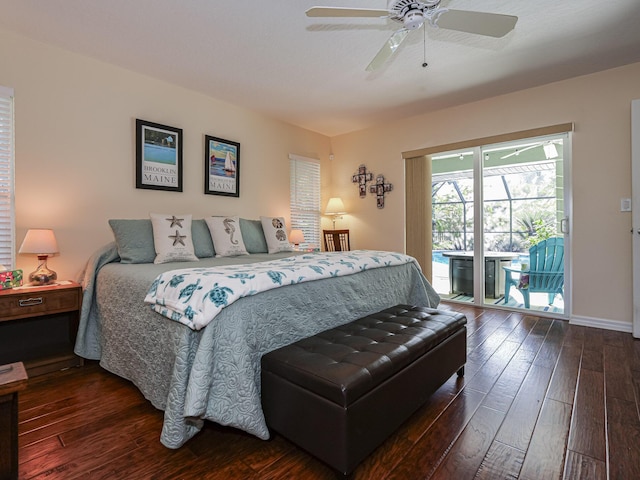 bedroom featuring dark wood-type flooring, access to outside, and ceiling fan