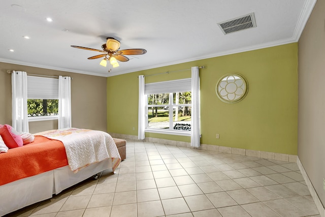 bedroom with light tile patterned flooring, ceiling fan, ornamental molding, and multiple windows