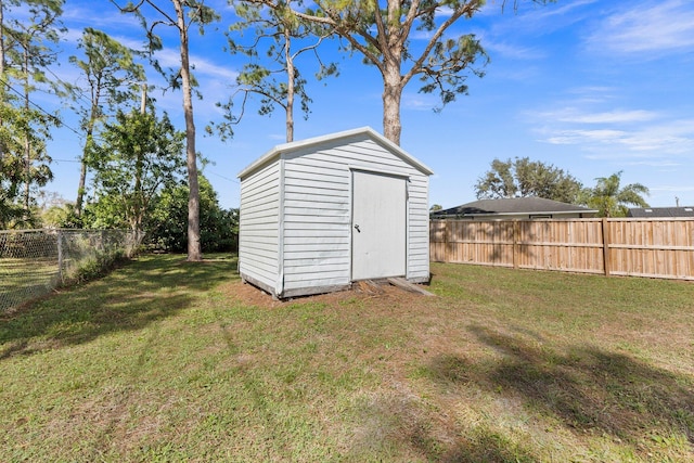 view of outdoor structure with a yard