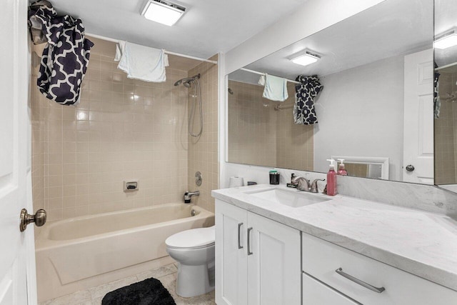 full bathroom featuring tile patterned floors, toilet, shower / bath combo with shower curtain, and vanity