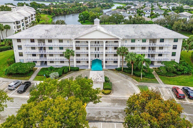 view of building exterior featuring a water view