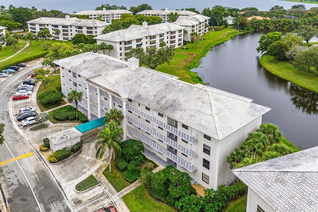 bird's eye view with a water view