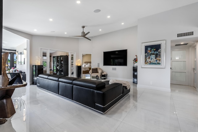 living room featuring ceiling fan