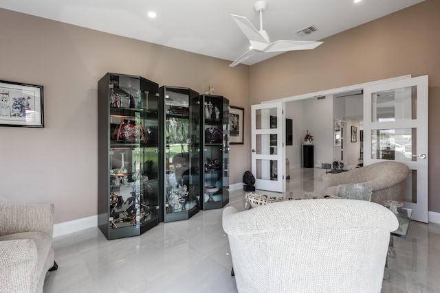 living room featuring ceiling fan