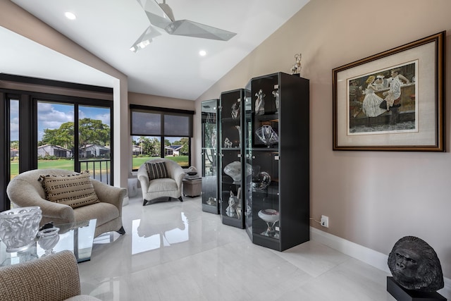 sitting room featuring lofted ceiling and ceiling fan