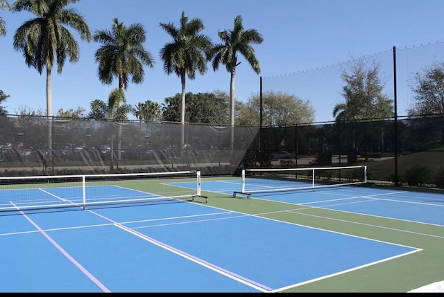 view of tennis court with basketball court