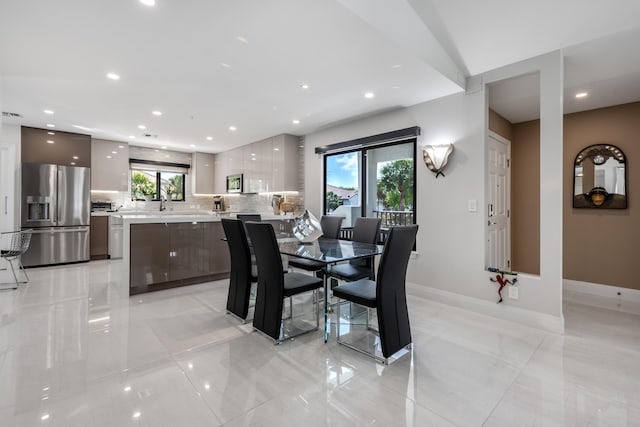 dining area with a wealth of natural light