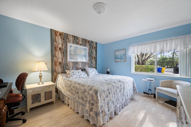 bedroom with light wood-type flooring