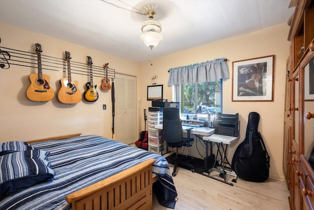 bedroom with light hardwood / wood-style flooring